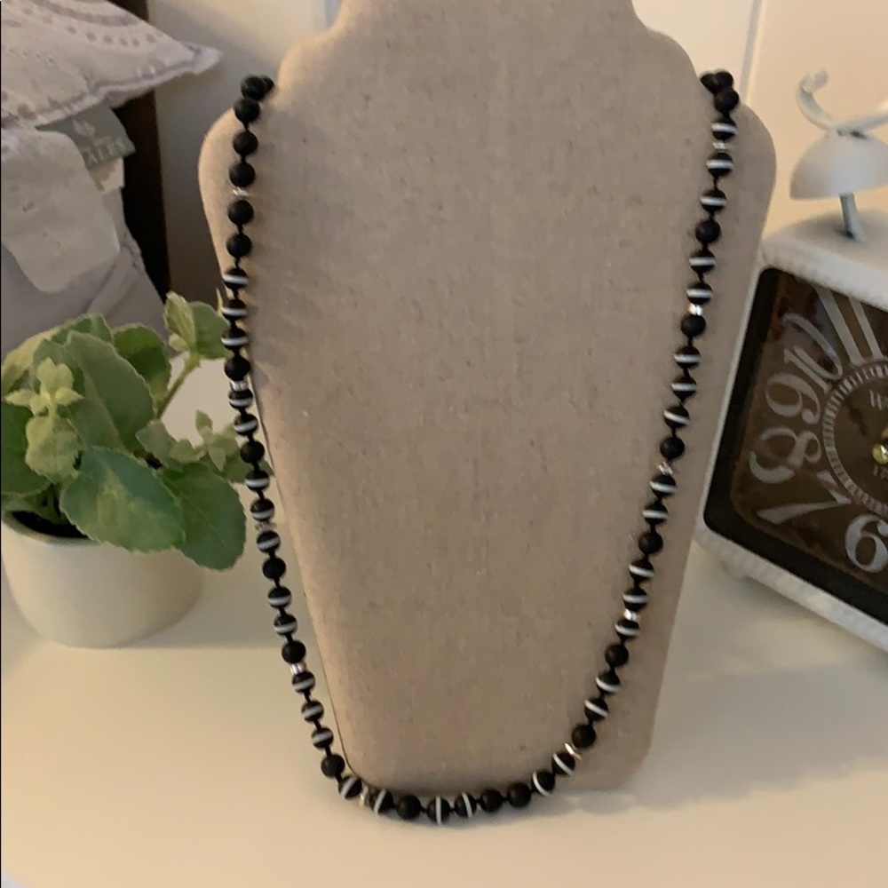 Black pearl and silver necklace